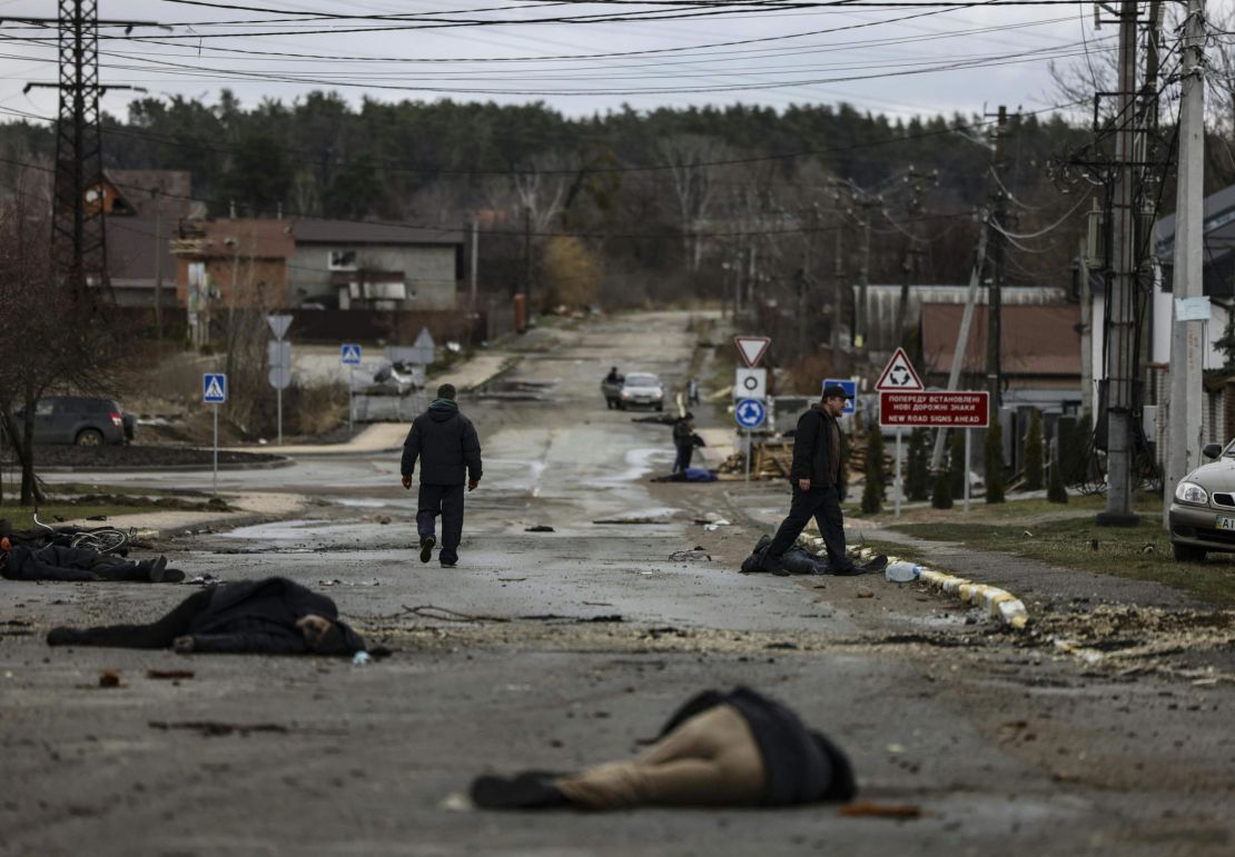 Bodies lie on a street in Bucha, northwest of Kyiv, on April 2, 2022.