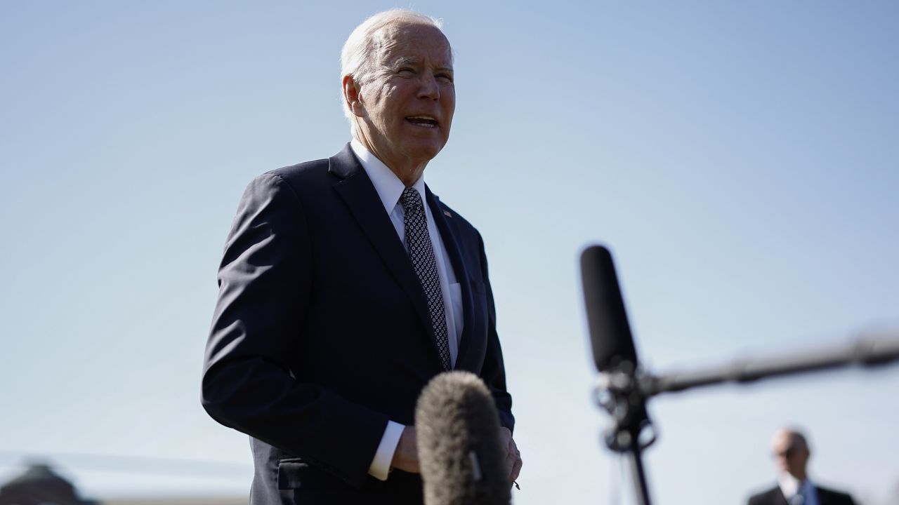 President Joe Biden speaks with members of the media after arriving at Fort Lesley J. McNair in Washington on April 4, 2022.