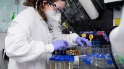 A lab technician tests wastewater samples from around the United States for the coronavirus at Biobot Analytics, in Cambridge, Massachusetts, U.S., February 22, 2022. 