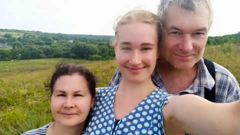 Alla Renska, pictured here with her parents in Ukraine.