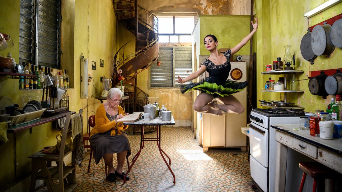 Cuban National Ballet dancer Yanlis Abreu Gonzalez leaps in wonderful fashion in Jossie's kitchen in Havana. Image captured by Joe McNally.