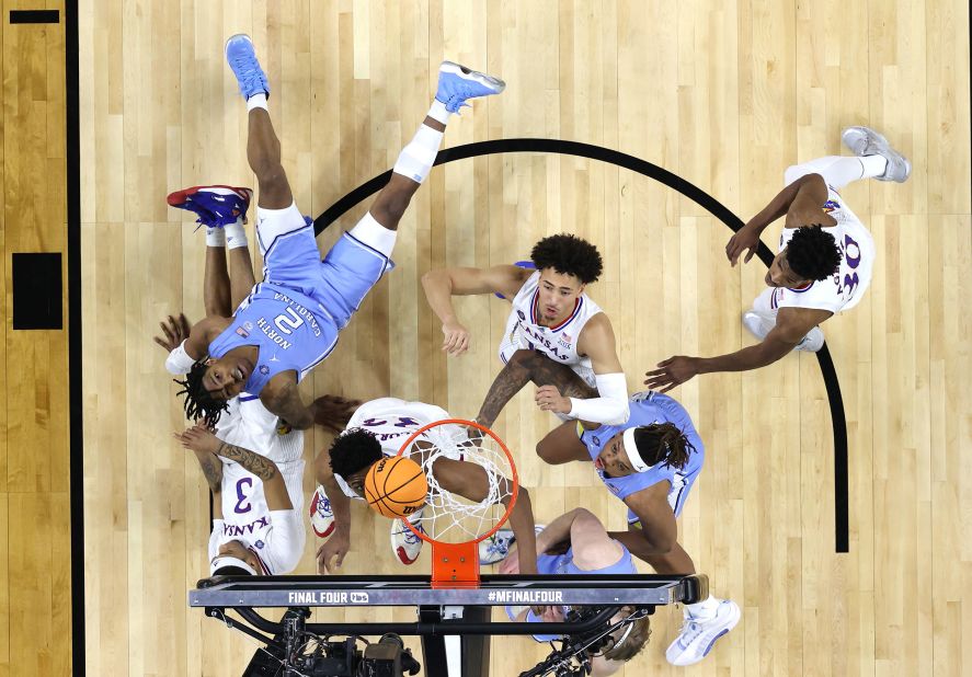 Players watch the ball for a possible rebound.