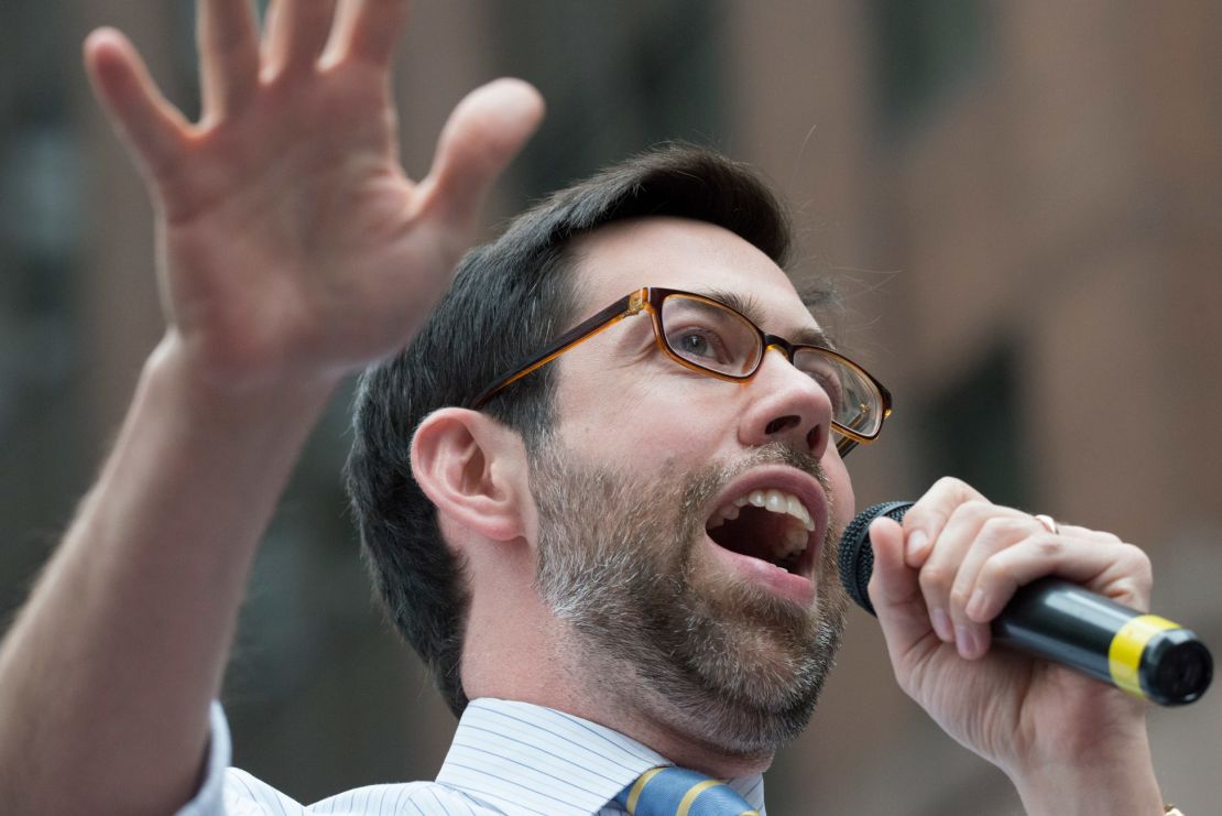 Daniel Squadron, seen here speaking at a rally in 2016,  thinks state legislative races are they key to safeguarding the 2024 preidential election. 