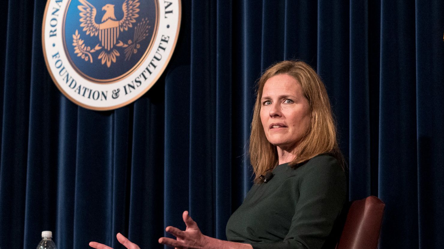 Supreme Court Justice Amy Coney Barrett speaks with Board of Trustees Chairman Frederick J. Ryan Jr. at the Ronald Reagan Presidential Library Foundation in Simi Valley, California, Monday, April 4, 2022.