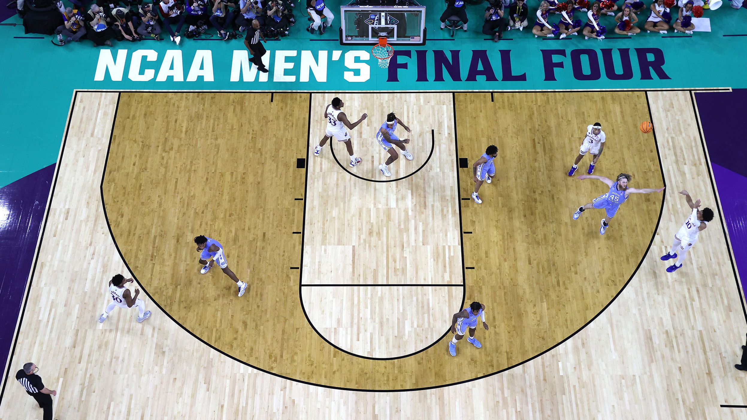Kansas' Jalen Wilson shoots over North Carolina's Brady Manek in the second half. North Carolina led 40-25 at halftime, but Kansas made up the deficit quickly in the second half.