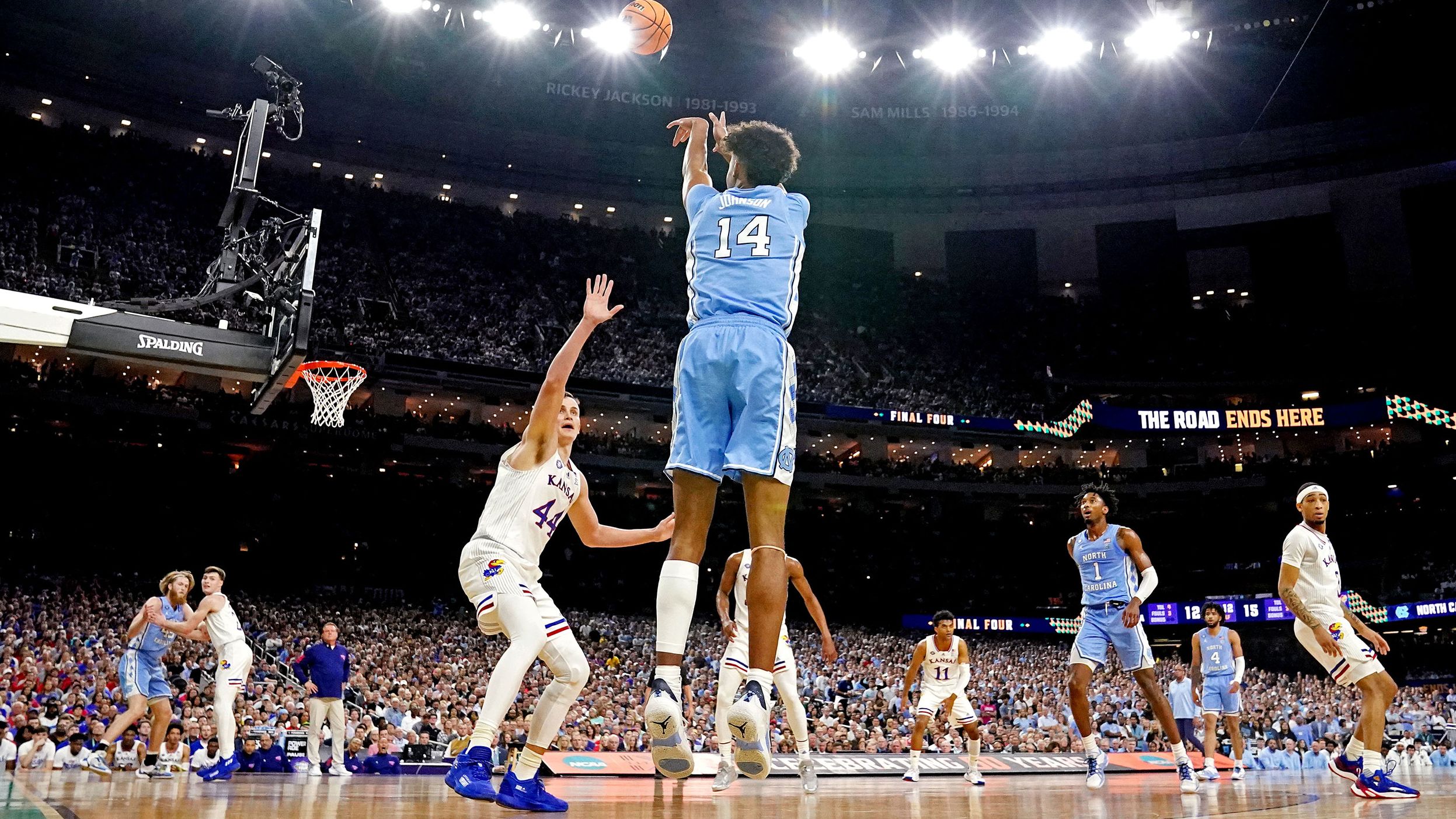 Johnson shoots a 3-pointer.
