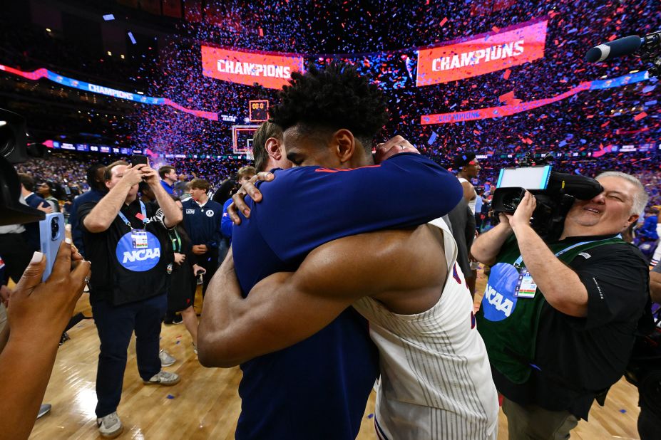 Self and Kansas' Ochai Agbaji hug after the game. Agbaji was named the NCAA Tournament's Most Outstanding Player.