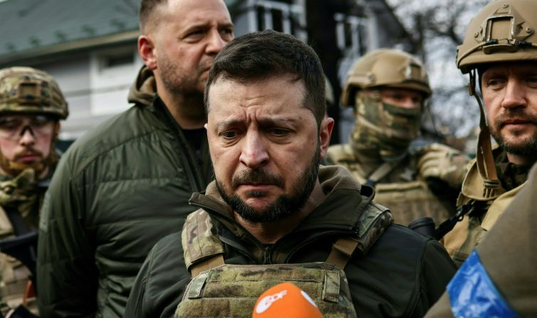 Ukrainian President Volodymyr Zelensky speaks to the media about the alleged atrocities in Bucha on April 4. "It's very difficult to negotiate when you see what (the Russians) have done here," <a href="index.php?page=&url=https%3A%2F%2Fwww.cnn.com%2Feurope%2Flive-news%2Fukraine-russia-putin-news-04-04-22%2Fh_eef60451c061f151c1a6a3ec1105a1ab" target="_blank">Zelensky emphasized</a> as he stood in the town, surrounded by security.