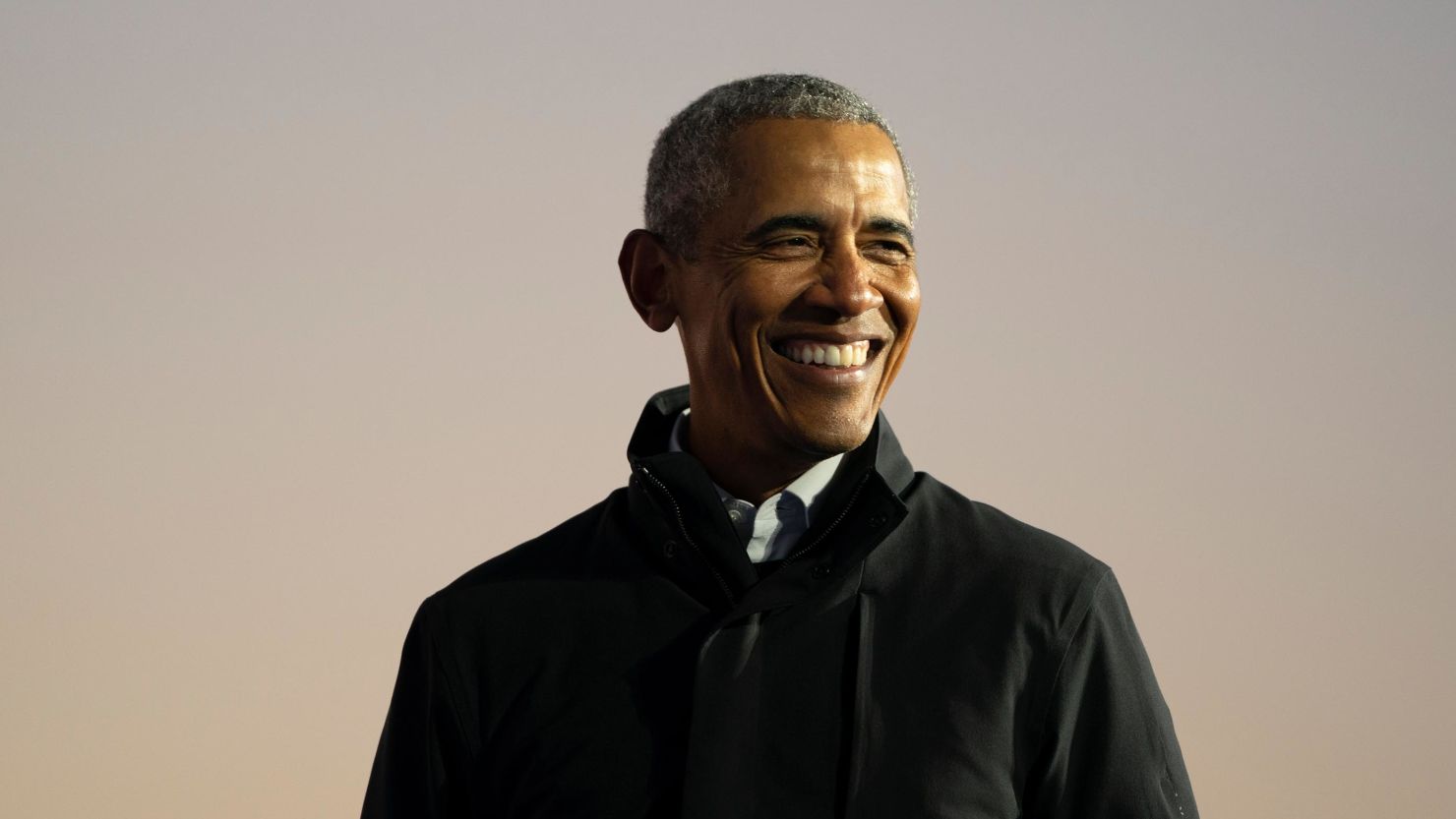 Former President Barack Obama speaks during a drive-in campaign rally with then-Democratic presidential nominee Joe Biden on October 31, 2020 in Detroit, Michigan. 