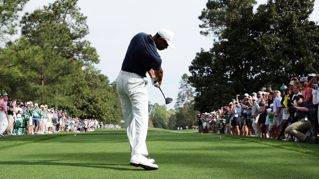 Woods plays his shot from the ninth tee during a practice round prior to the 2022 Masters. 