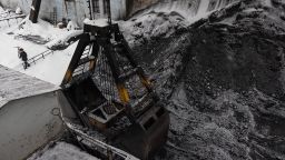 A bucket loads coking coal from the yard at the Moscow coke and gas plant, operated by Mechel PJSC, in Vidnoye, near Moscow, Russia, on Monday, Jan. 24, 2022. 