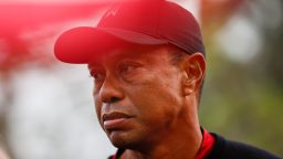 PACIFIC PALISADES, CALIFORNIA - FEBRUARY 20: Tiger Woods, tournament host, looks on during the trophy ceremony honoring tournament champion, Joaquín Niemann of Chile after the final round of The Genesis Invitational at Riviera Country Club on February 20, 2022 in Pacific Palisades, California. (Photo by Cliff Hawkins/Getty Images)