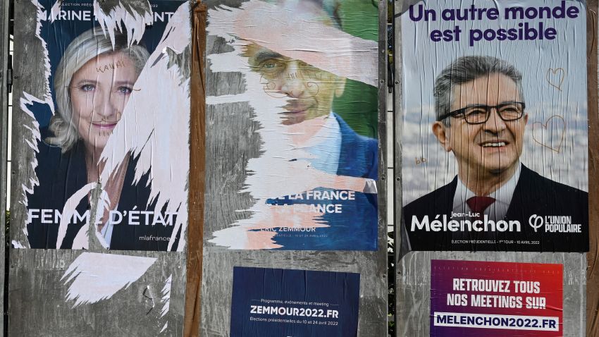 A picture taken on March 31, 2022 shows posters of far-right Party (RN) presidential candidate Marine Le Pen (L), far-right Party (Reconquete) presidential candidate Eric Zemour (C) and left-wing candidate Jean-Luc Mélenchon (La France Insoumise) in Montpellier. - March 28, 2022 marked the start of the official campaign period running up to the first round of voting on April 10, with all 12 candidates now entitled to equal time and space in the domestic media. The top two candidates in the first round will go through to a run-off on April 24. (Photo by Pascal GUYOT / AFP) (Photo by PASCAL GUYOT/AFP via Getty Images)