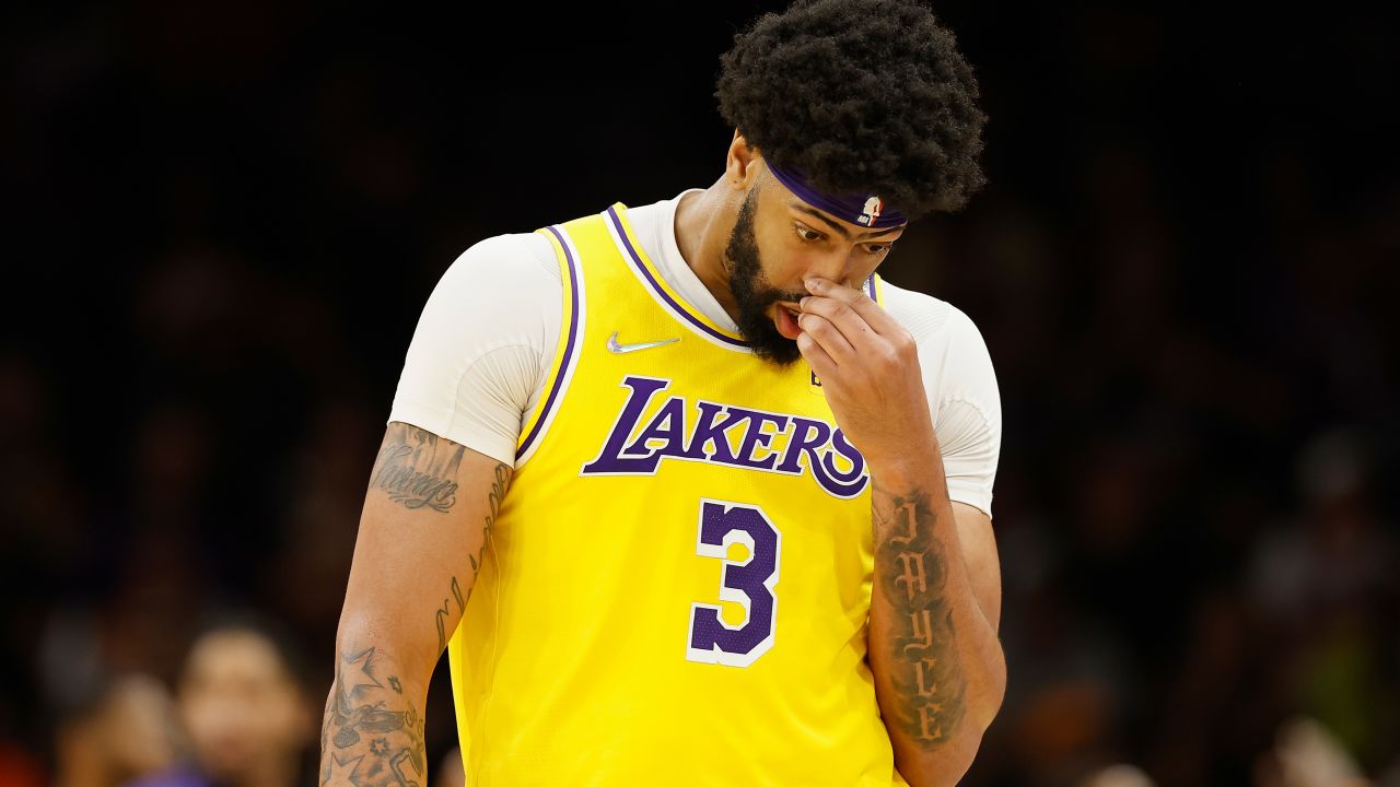 Los Angeles Lakers center Anthony Davis walks to the bench during the defeat.