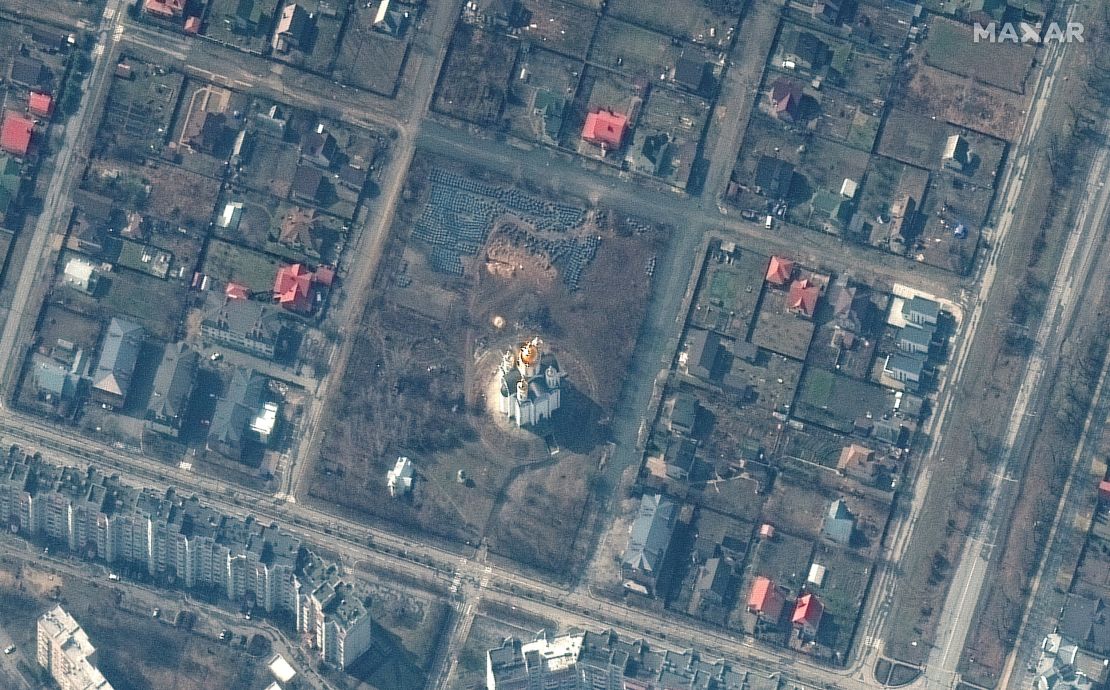 A satellite image of a mass grave in Bucha, Ukraine