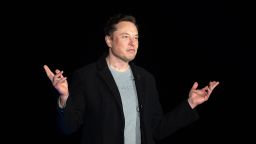Elon Musk gestures as he speaks during a press conference at SpaceX's Starbase facility near Boca Chica Village in South Texas on February 10, 2022. 