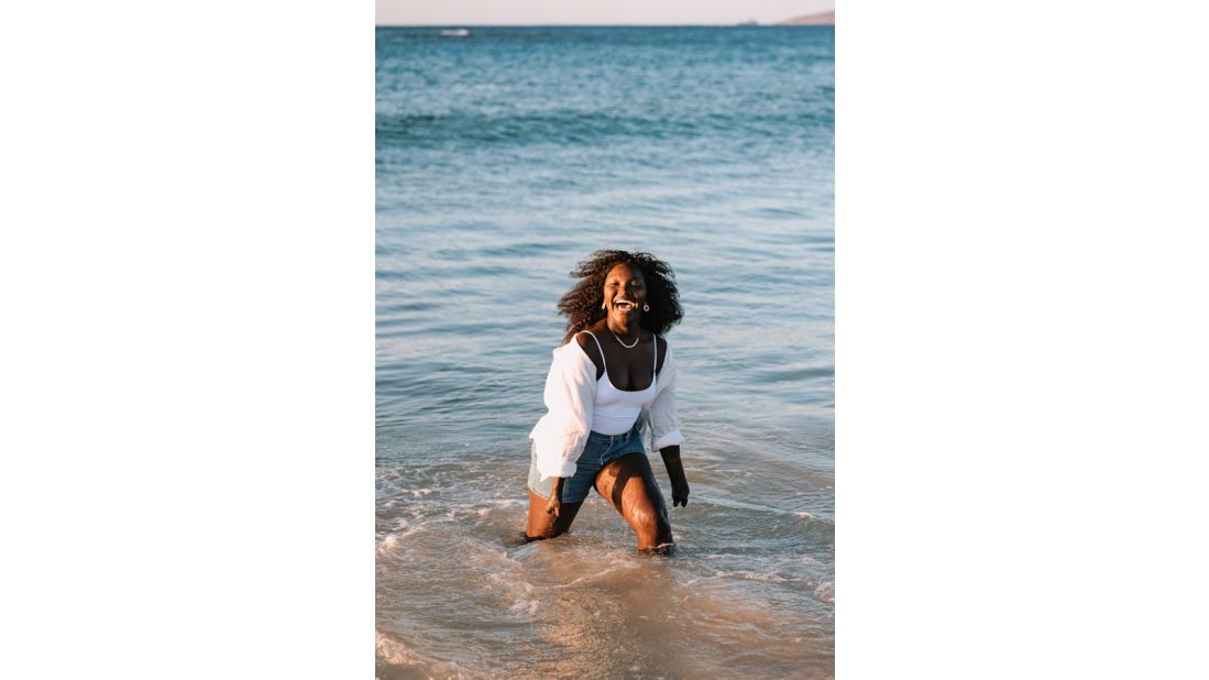 <strong>Showcasing changemakers:</strong> Social worker and advocate Esther Onek plays around on the beach in an image by photographer Jarrad Seng.