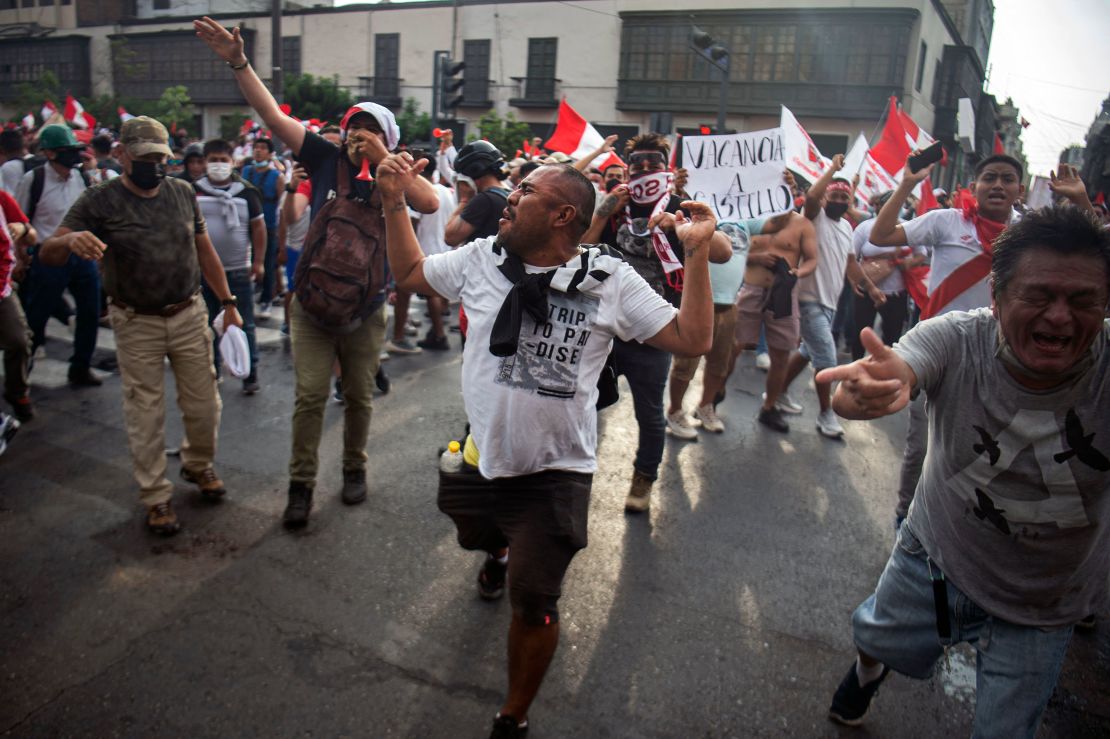 Demonstrators protest Peruvian President Pedro Castillo's government in Lima on Tuesday. 