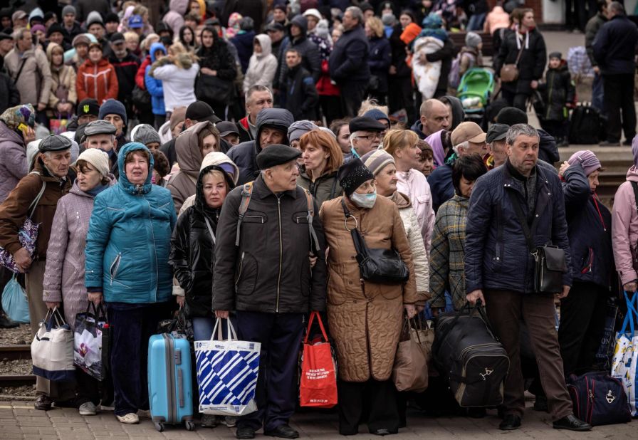 People wait to board a train as they flee Kramatorsk, Ukraine, on April 5.