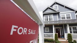 In this April 1, 2020 photo, a "For Sale" sign stands in front of a home that is in the process of being sold in Monroe, Wash., outside of Seattle. 