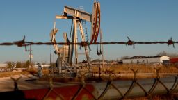 An oil pumpjack works in the Permian Basin oil field on March 13, 2022 in Odessa, Texas. 