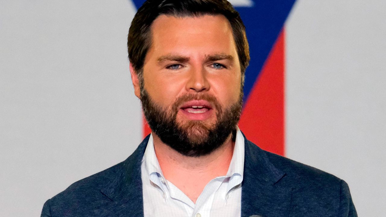 FILE - JD Vance, the venture capitalist and author of "Hillbilly Elegy," addresses a rally, July 1, 2021, in Middletown, Ohio. As war rages in Ukraine, ties to business deals involving Russia are threatening potential political fallout to candidates in Ohio's crowded Republican primary for an open U.S. Senate seat. (AP Photo/Jeff Dean, File)