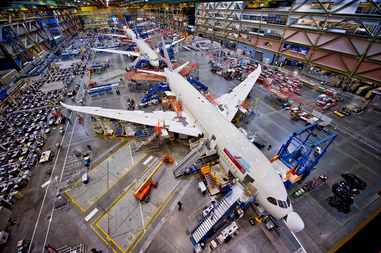 The latest Boeing aircraft have raked or backward-sweeping wingtops instead of winglets.