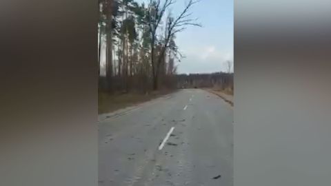 The video shows a group of soldiers on a road following a fight.
