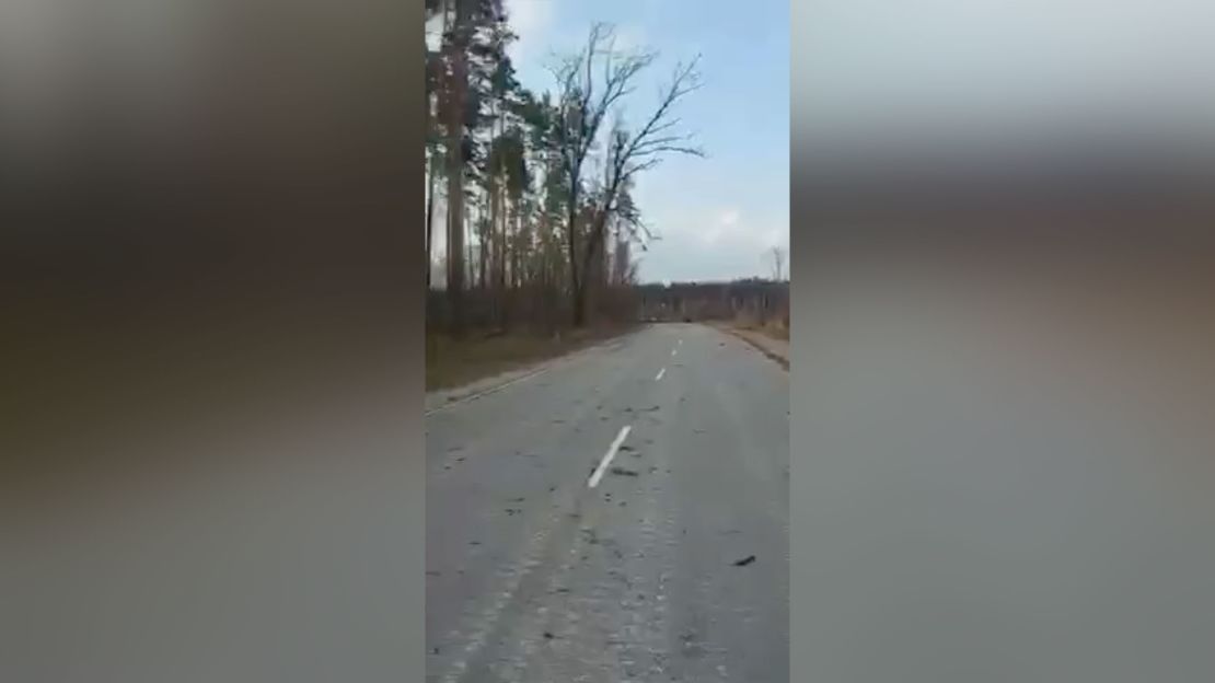 The video shows a group of soldiers on a road following a fight.