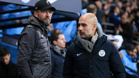 Klopp (L) and Guardiola (R) have been coy in press conferences regarding their side's title chances.