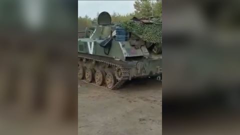 A Russian military vehicle marked with the "V" sign is seen in the video, filmed in Ukraine's Kyiv region.
