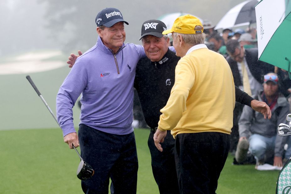 From left, honorary starters Tom Watson, Gary Player and Jack Nicklaus gather on the first tee Thursday.