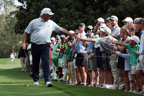 Couples greets fans during a practice round on Monday. Couples won the Masters in 1992 and remains a fan favorite.