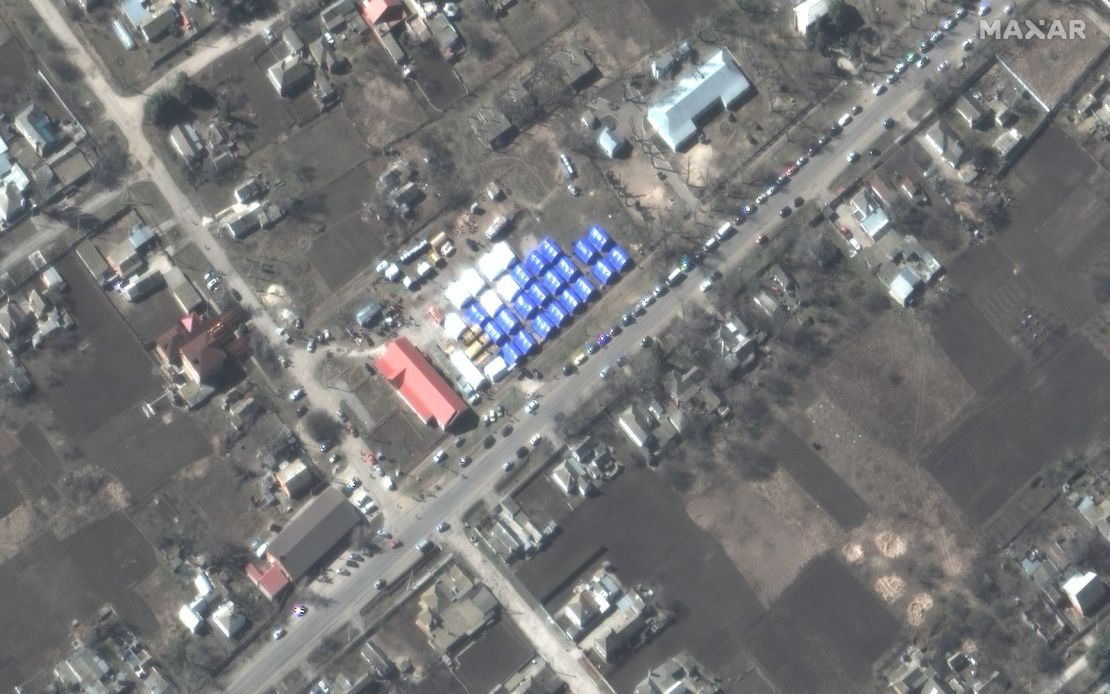 Maxar satellite images show the tent camp in Bezimenne on March 22.