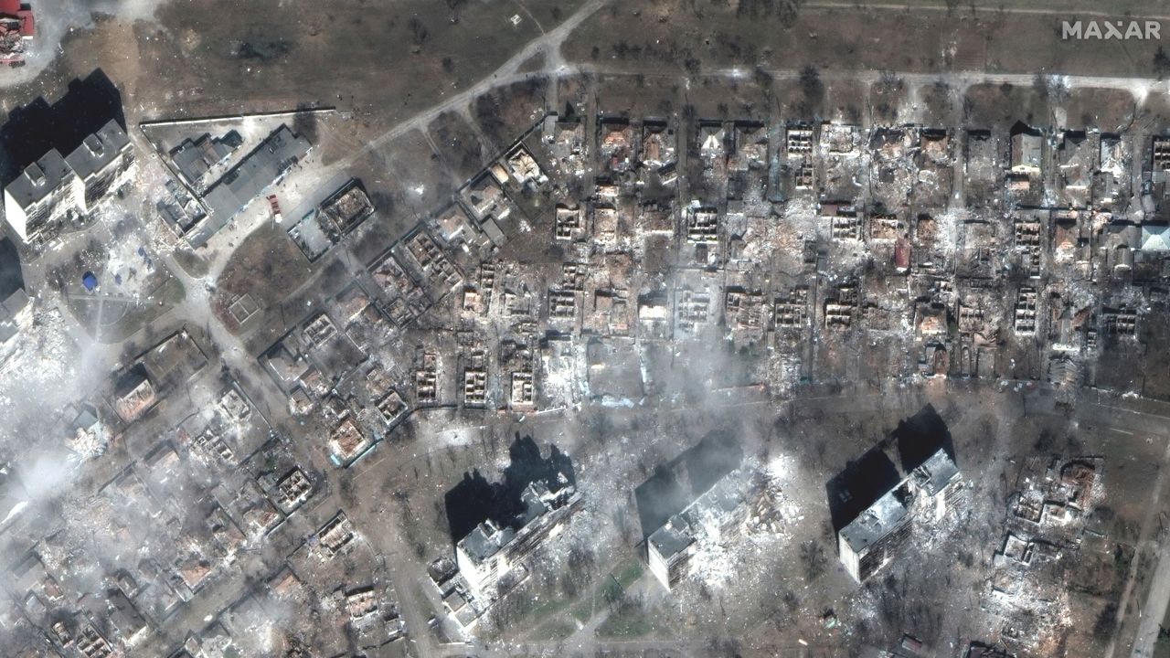 Almost every house surrounding two separate apartment complexes is destroyed in eastern Mariupol.