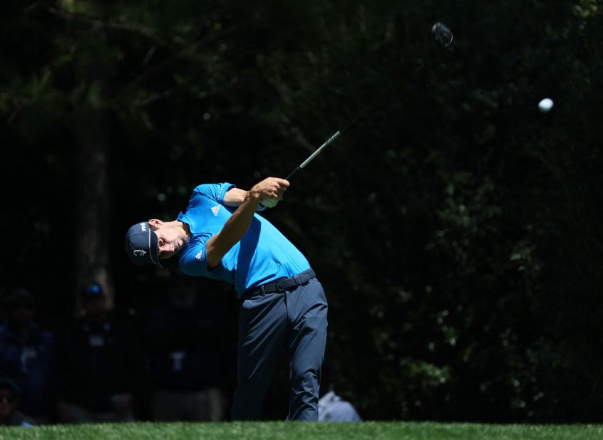 Joaquin Niemann tees off on the 11th hole Thursday.