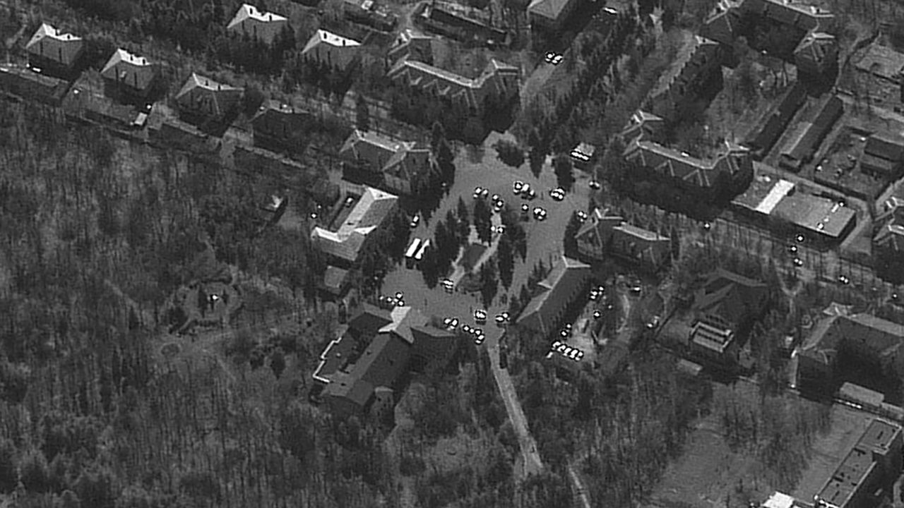 A March 21 satellite image of the Centre of Culture and Leisure in Dokuchaevsk shows buses outside.