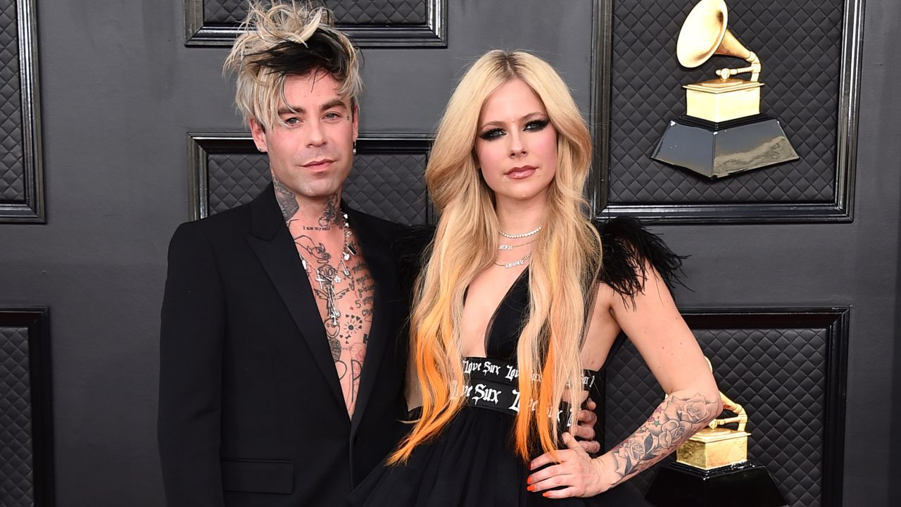 Avril Lavigne (right), seen here at the recent Grammy Awards, has announced she is getting married to partner Mod Sun (left), who proposed to her at the end of March while in Paris. 