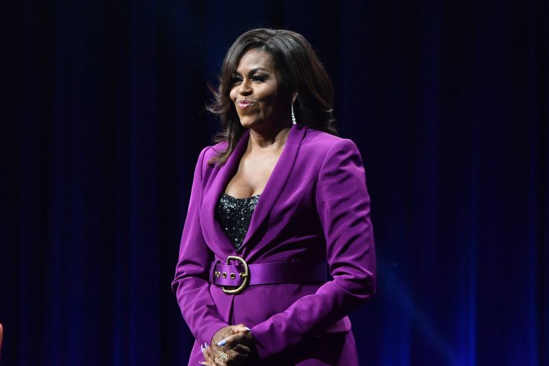 Michelle Obama praises Biden but stops short of full throated 2024