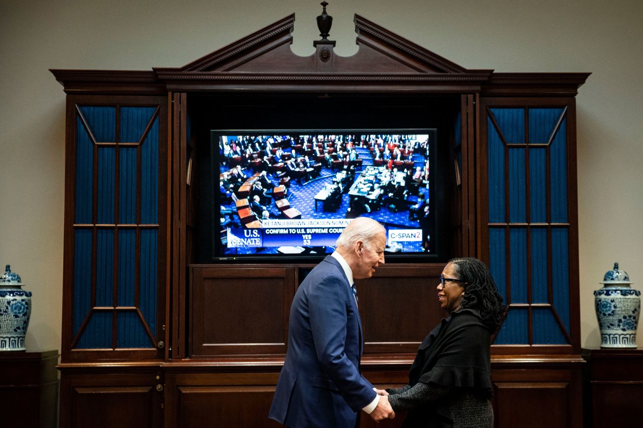 Biden congratulates Jackson during her confirmation vote in April 2022. <a href="https://www.cnn.com/politics/live-news/ketanji-brown-jackson-senate-confirmation-vote/h_d4a99376976ed52d23742f6b1ac28a95" target="_blank">They watched the Senate vote</a> from the Roosevelt Room in the White House.