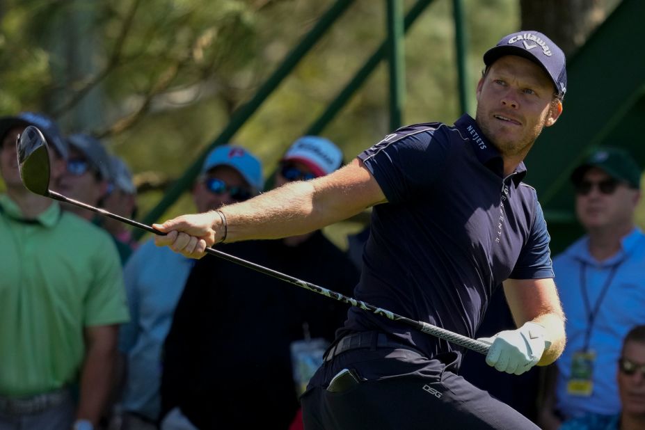 Former Masters champion Danny Willett reacts to his tee shot on No. 18.