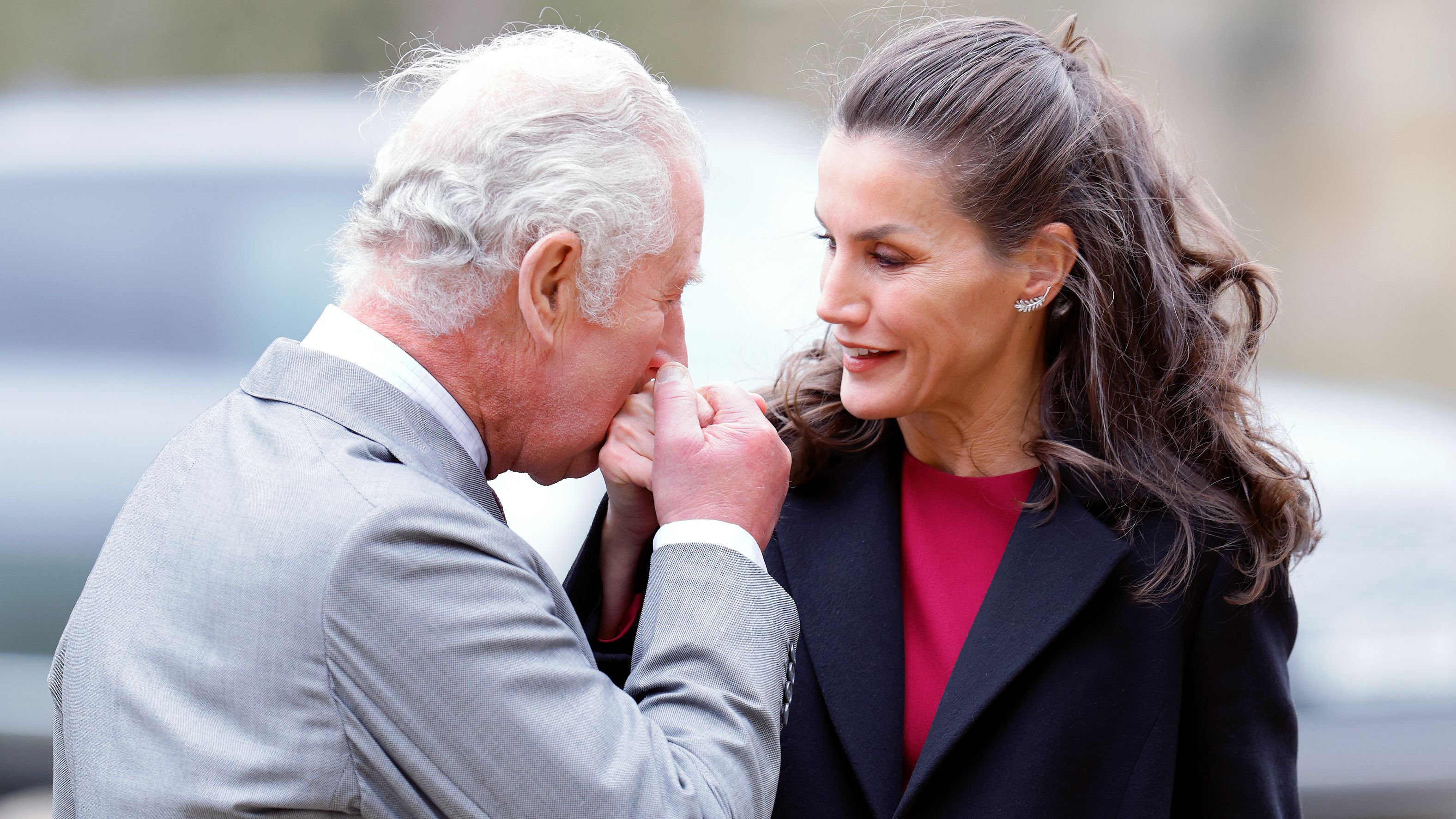 Prince Charles kisses Queen Letizia of Spain on the hand as she arrives to view the Francisco de Zurbarán art collection, Jacob and His Twelve Sons, at Auckland Castle on April 5, 2022.