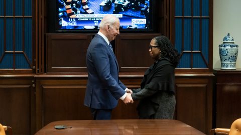 US President Joe Biden holds hands with Ketanji Brown Jackson as <a href="https://www.cnn.com/2022/04/07/politics/ketanji-brown-jackson-senate-vote-latest/index.html" target="_blank">she was confirmed to the US Supreme Court</a> on Thursday, April 7. They watched the Senate vote from the Roosevelt Room of the White House.