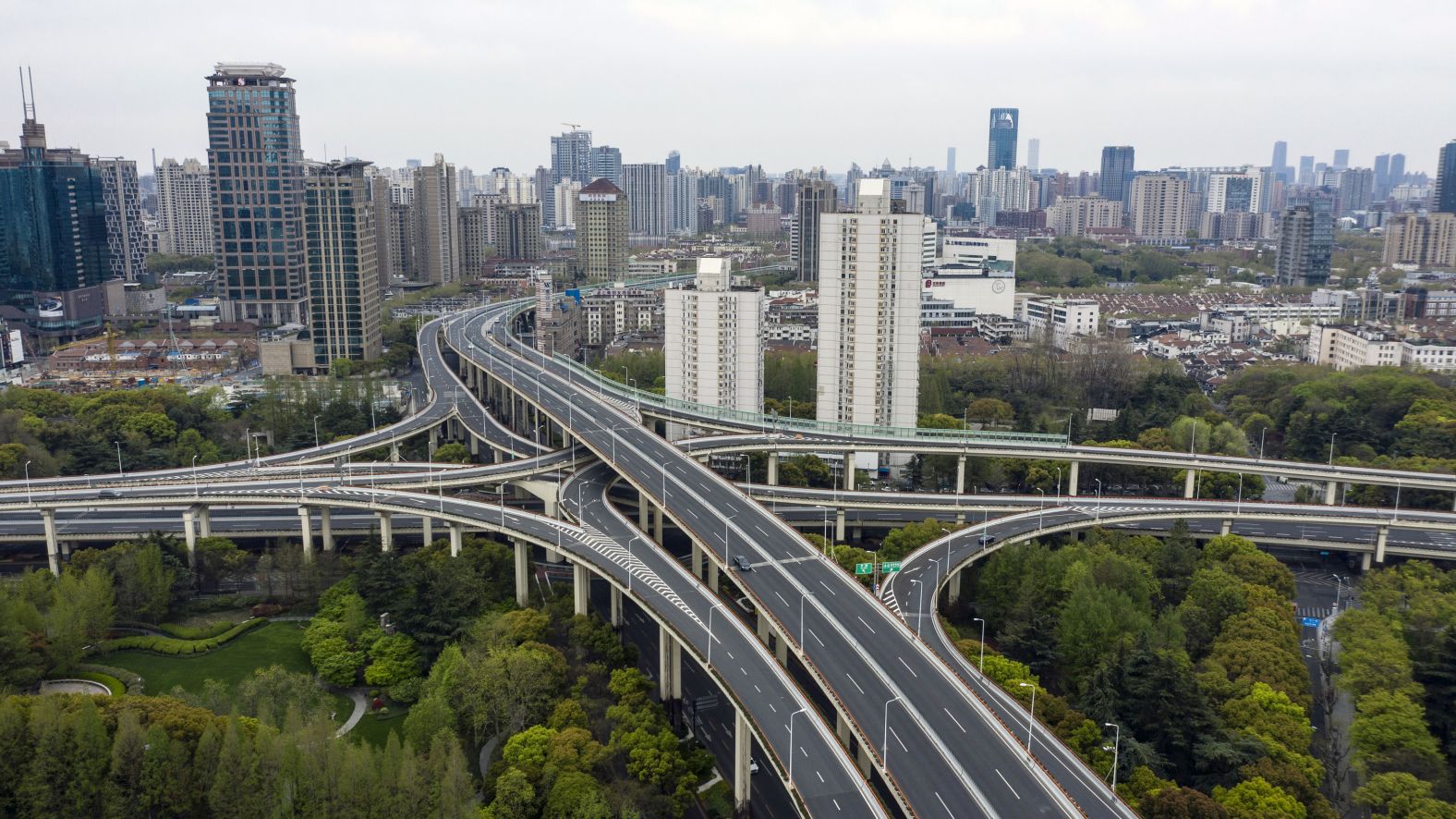 Roads are empty in Shanghai, China, on Tuesday, April 5, as the country continues to battle <a href="index.php?page=&url=https%3A%2F%2Fwww.cnn.com%2F2022%2F04%2F06%2Fchina%2Fchina-covid-outbreak-explainer-intl-hnk%2Findex.html" target="_blank">its biggest wave yet of Covid-19.</a> Several cities were placed under varying levels of lockdown in March. Many of those lockdowns eased by early April, leaving Shanghai as the outlier.
