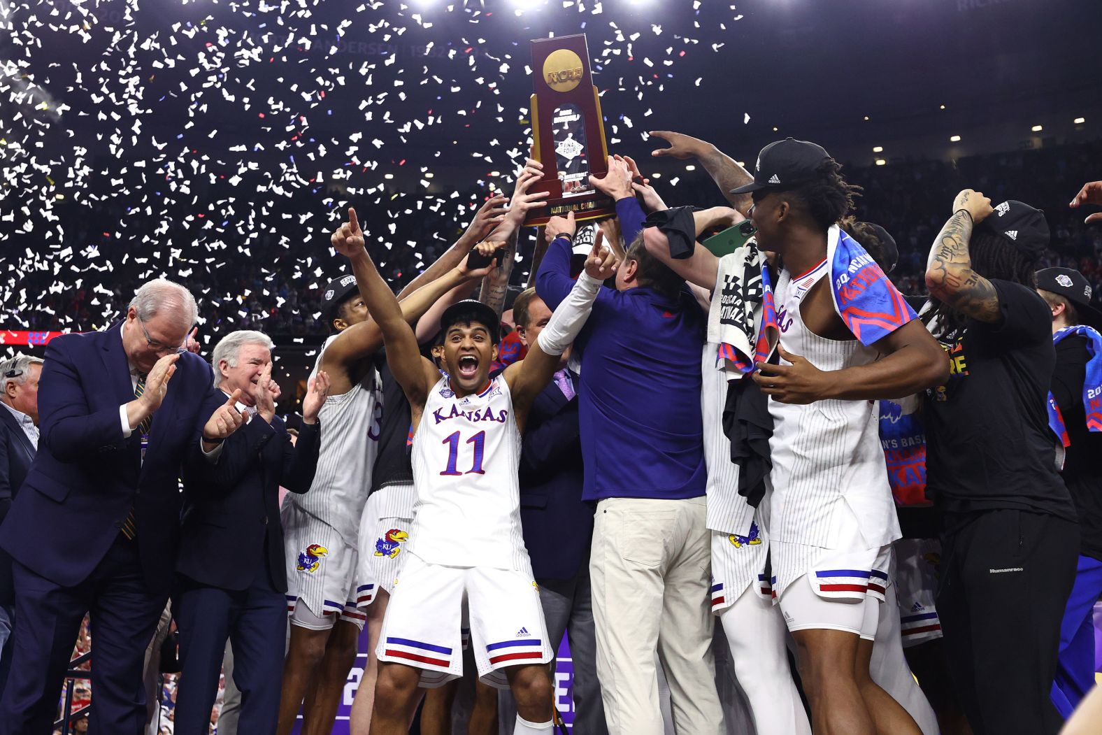 The Kansas Jayhawks celebrate after <a href="index.php?page=&url=http%3A%2F%2Fwww.cnn.com%2F2022%2F04%2F04%2Fsport%2Fgallery%2Fkansas-north-carolina-ncaa-mens-final-photos%2Findex.html" target="_blank">winning the national championship in men's basketball</a> on Monday, April 3. The Jayhawks made the biggest comeback ever in an NCAA Tournament final, rallying from 16 down to defeat North Carolina and win their fourth title in school history.