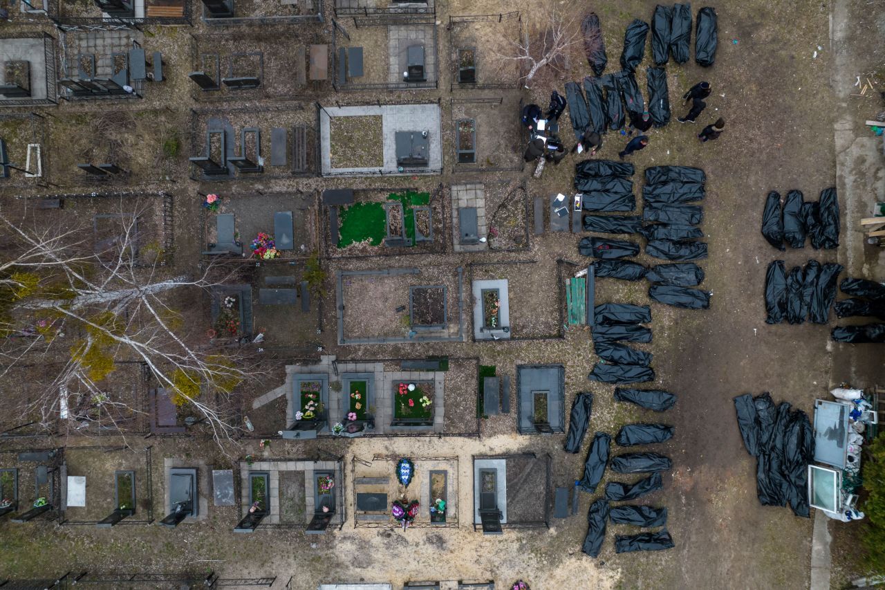 Body bags are seen in Bucha, Ukraine, as police officers work to identify the dead on Wednesday, April 6. The suburb's name has become a byword for war crimes this week after <a href="https://www.cnn.com/2022/04/05/europe/bucha-ukraine-russian-occupation-reality-intl-cmd/index.html" target="_blank">accounts of summary executions, brutality and indiscriminate shelling</a> emerged in the wake of Russia's hasty retreat.