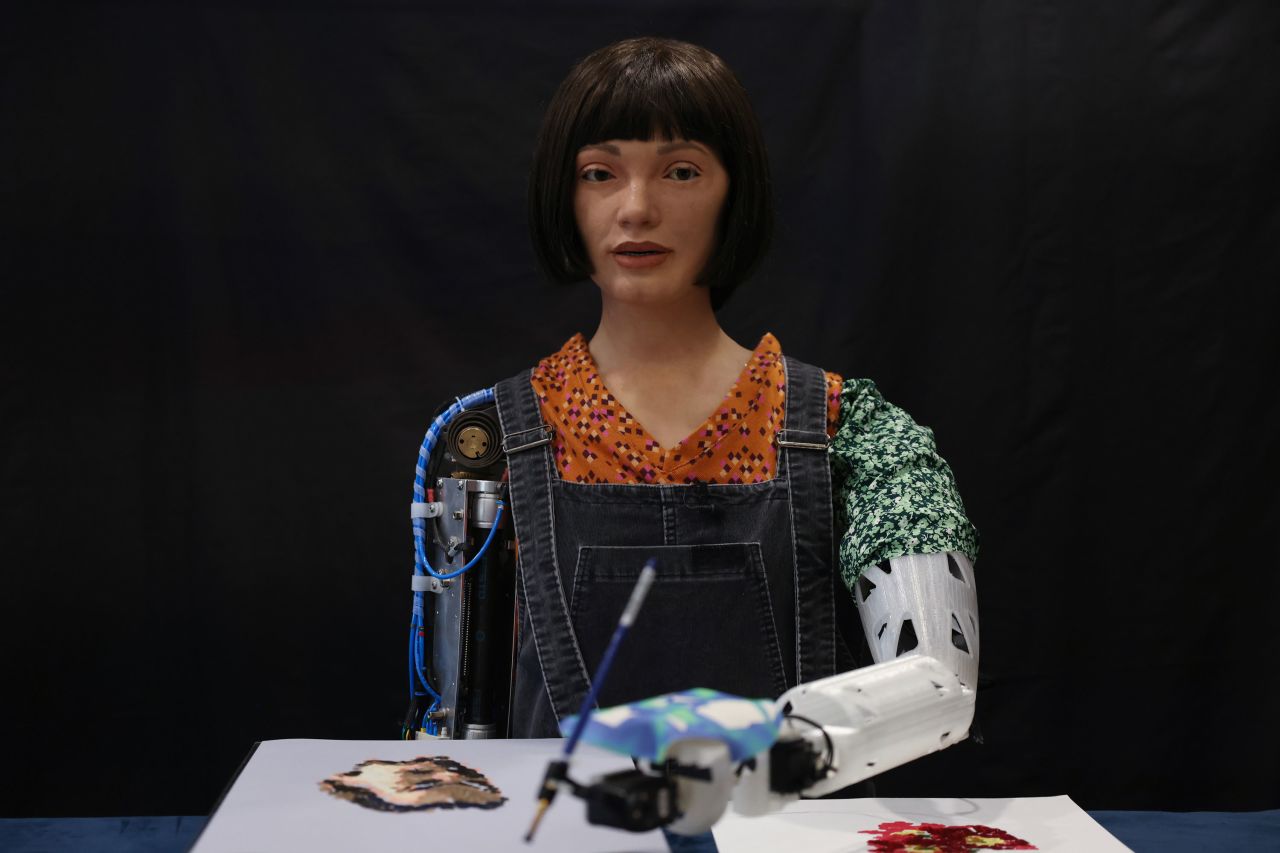 <a href="https://www.cnn.com/2021/11/27/tech/ai-da-robot-intl-scli-gbr/index.html" target="_blank">Ai-Da Robot,</a> an ultra-realistic humanoid robot artist, paints at the British Library in London on Monday, April 3.