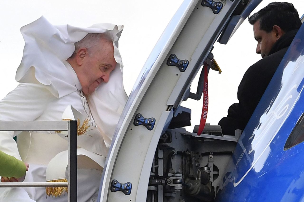 Pope Francis boards his plane in Rome as he leaves for a two-day trip to Malta on Saturday, April 2.