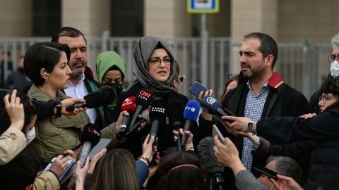 Hatice Cengiz, the fiancee of murdered Saudi critic Jamal Khashoggi, answers journalists' questions outside an Istanbul courthouse on April 7. The court confirmed a halt of the trial in absentia of 26 suspects linked to Khashoggi's killing and the transfer of the trial to Saudi Arabia. Cengiz said she would appeal the Turkish court's decision. Khashoggi, a 59-year-old journalist, was killed inside the Saudi consulate in Istanbul on October 2, 2018 in a gruesome murder that shocked the world.
