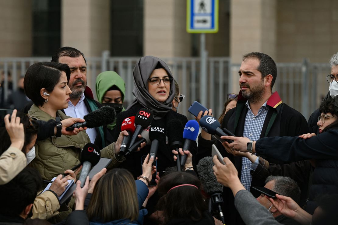 Hatice Cengiz, the fiancee of murdered Saudi critic Jamal Khashoggi, answers journalists' questions outside an Istanbul courthouse on April 7. The court confirmed a halt of the trial in absentia of 26 suspects linked to Khashoggi's killing and the transfer of the trial to Saudi Arabia. Cengiz said she would appeal the Turkish court's decision. Khashoggi, a 59-year-old journalist, was killed inside the Saudi consulate in Istanbul on October 2, 2018 in a gruesome murder that shocked the world.